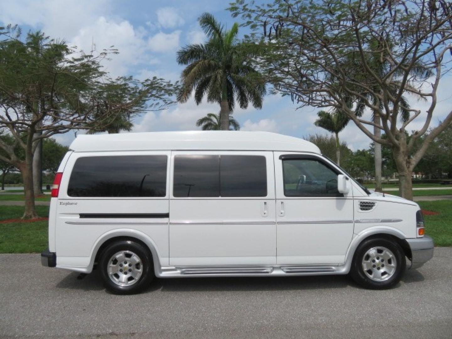 2010 White /Gray Chevrolet Express (1GNUGCD48A1) , located at 4301 Oak Circle #19, Boca Raton, FL, 33431, (954) 561-2499, 26.388861, -80.084038 - You are looking at a Gorgeous 2010 Chevy Express Handicap Wheelchair Conversion Van Explorer Limited SE with 31K Original Miles, Braun Century 750lb Side Entry Wheelchair lift, Tie Down System in the Floor, Rear Entertainment with Flat Screen TV/DVD, Leather Interior, Rear Power Folding Bench Seat/b - Photo#5